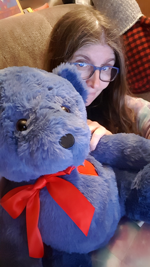 Kari with a big blue bear